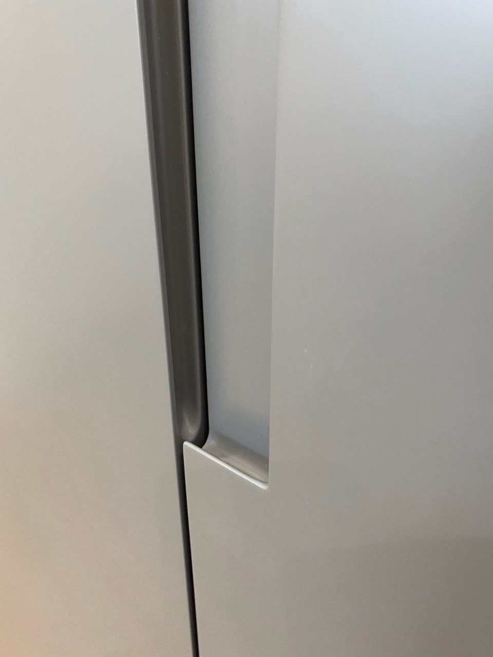 Detail · handle cut into the door