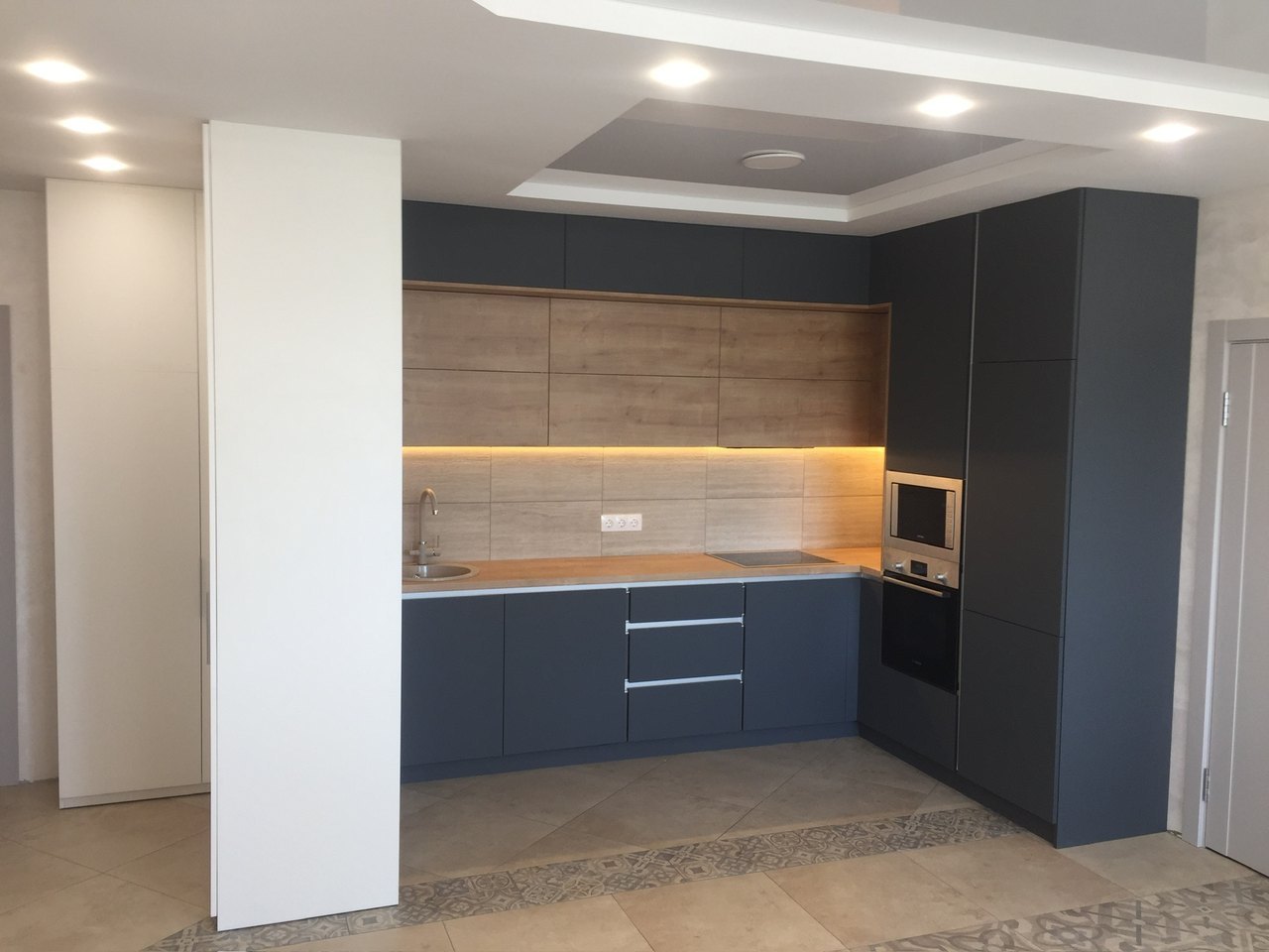 Two-tone kitchen with LED strip
