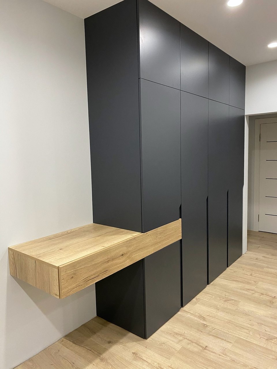 Wardrobe with floating desk